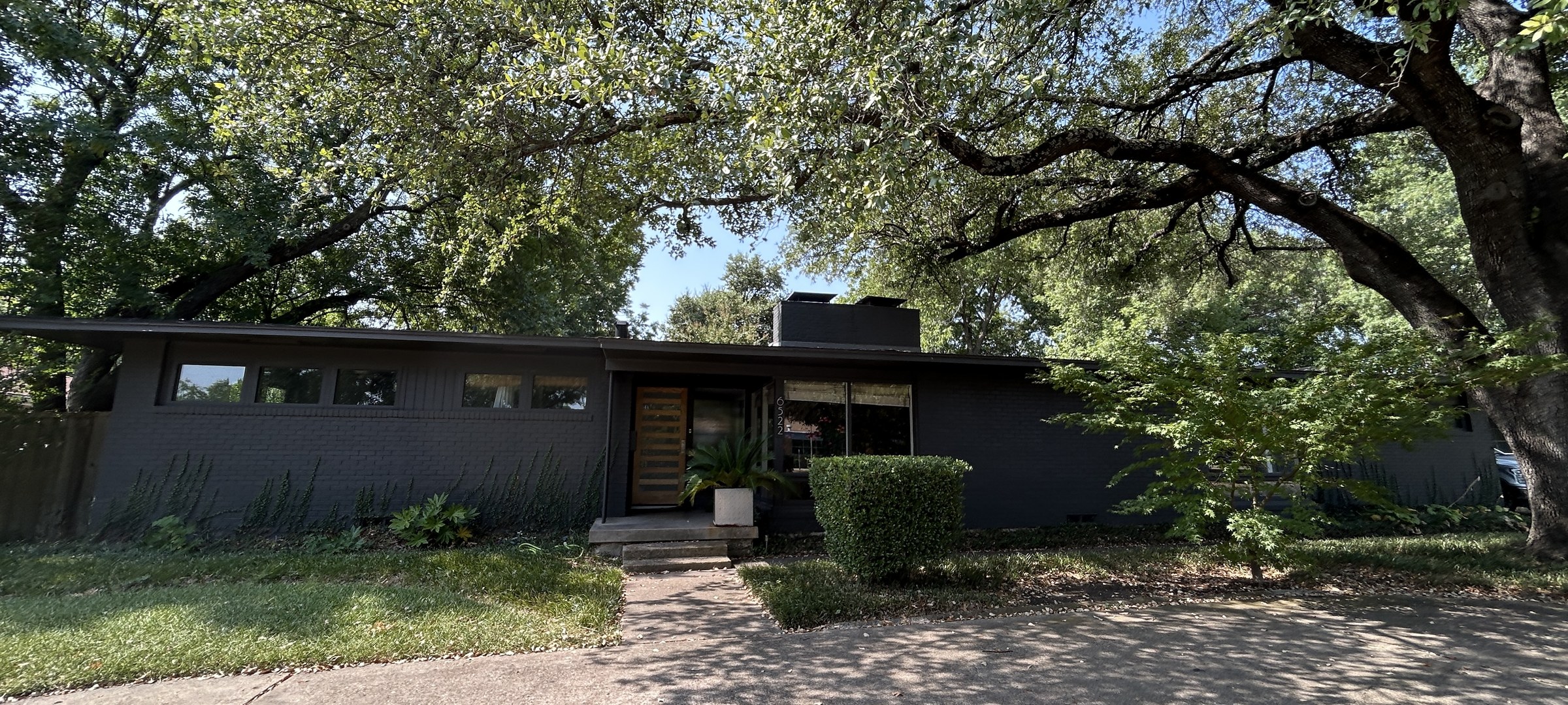 6522 Royal Lane frontage beneath mature trees
